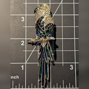 Elegant Gold and Green Parrot Brooch